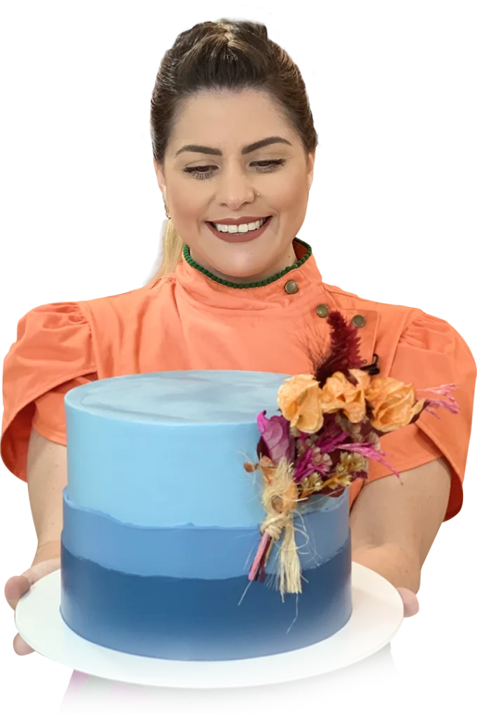 Hannah Barros segurando um bolo azul decorado